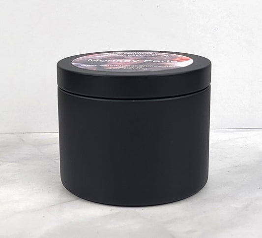 Monkey Farts 4oz Soy Candle in black candle tin showing side profile