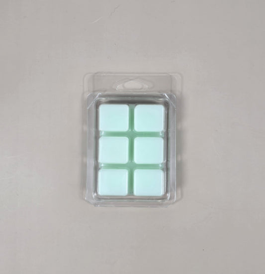 Packaged product with six square compartments on a gray background