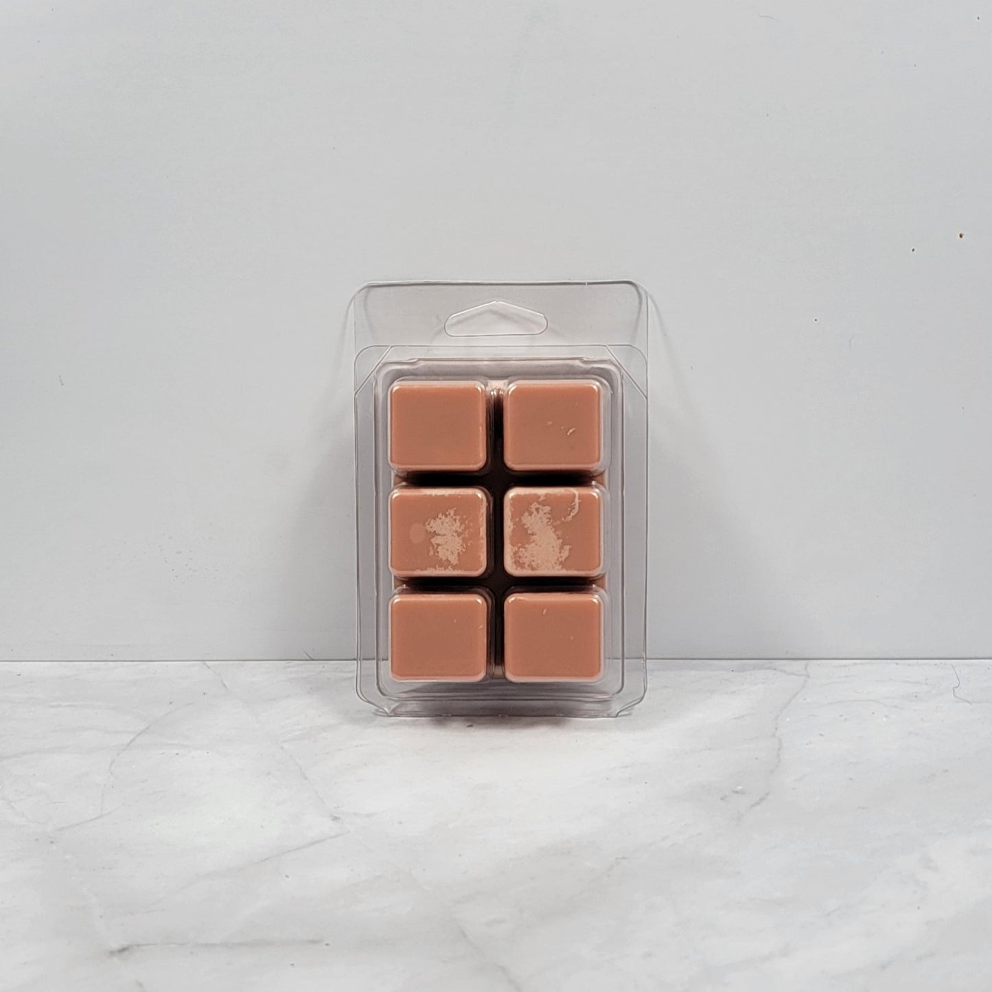 Masculine wax melt featuring tobacco leaf and mahogany scent