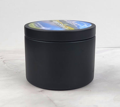 Eco-friendly candle with eucalyptus, pine, and juniper notes