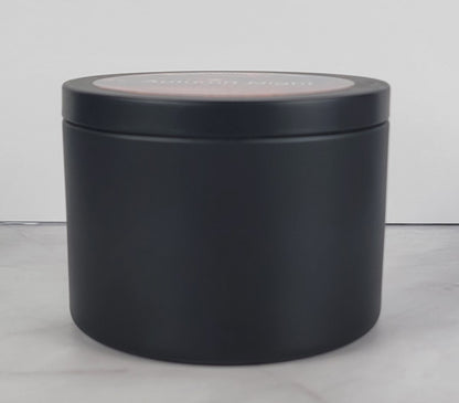 Autumn Night 8oz Soy Candle in black travel tin with lid closed