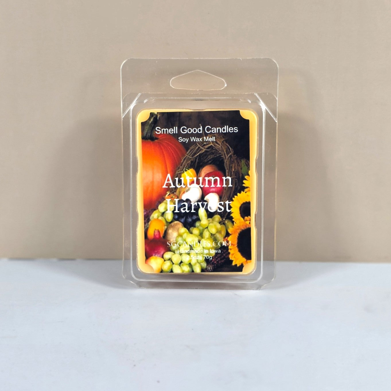 Autumn Harvest wax melt from Smell Good Candles, featuring notes of citrus, clove, and nutmeg.