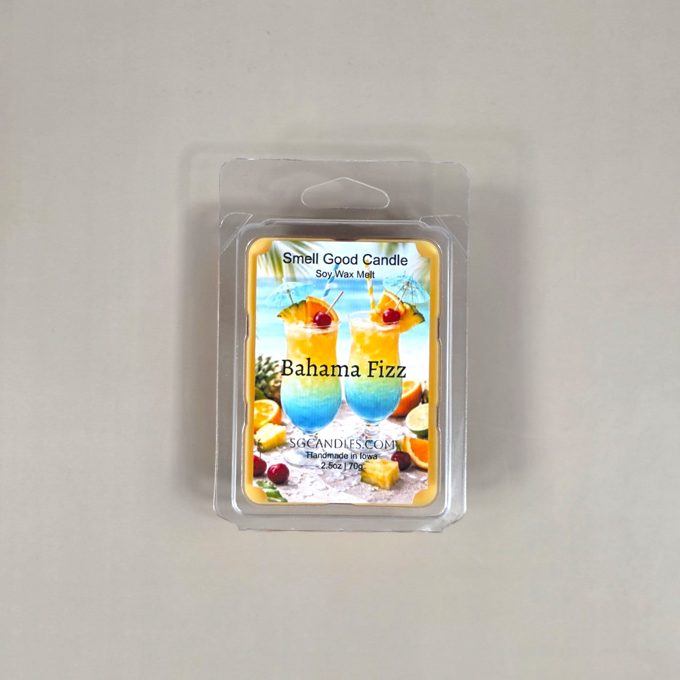 Bahama Fizz soy wax melt 2.5oz clamshell featuring a tropical label with colorful island cocktails and fresh fruit.