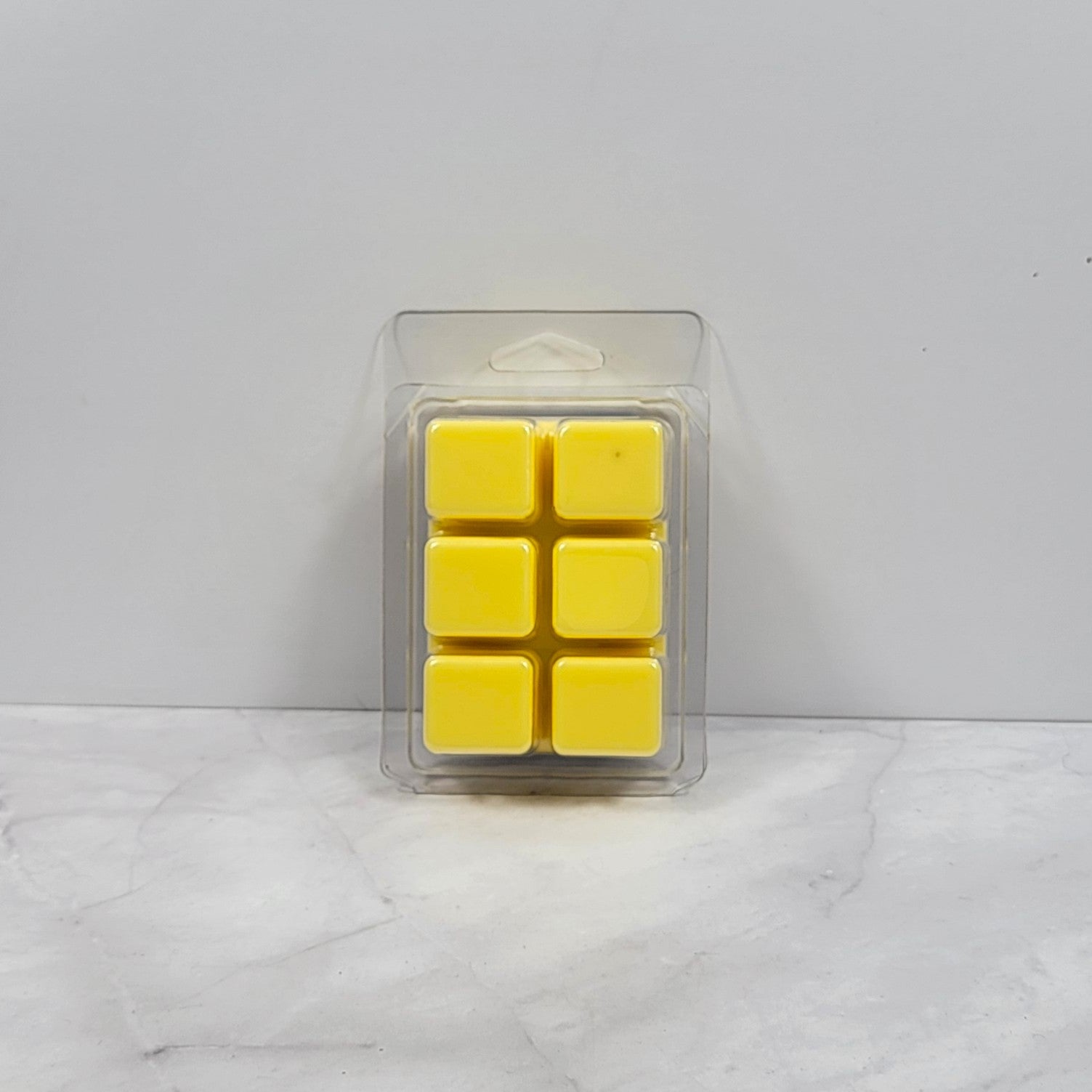 Hand-poured soy wax melt evoking a beach getaway
