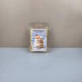 Wax melt package labeled 'Banana Pudding' on a neutral background