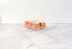 Eco-friendly soy wax melt in rustic woodsy scent profile