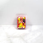 Candle melt wax bar in packaging with fruit illustration on a white background