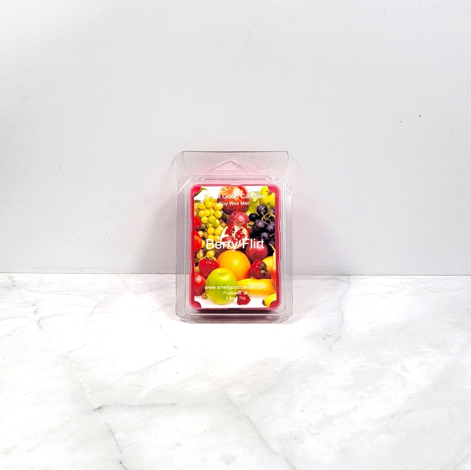 Candle melt wax bar in packaging with fruit illustration on a white background