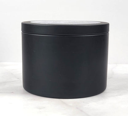Masculine scented candle with sandalwood, pine, and citrus