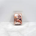 Wax melt package labeled 'Brown Sugar & Fig' on a white surface with a light gray background