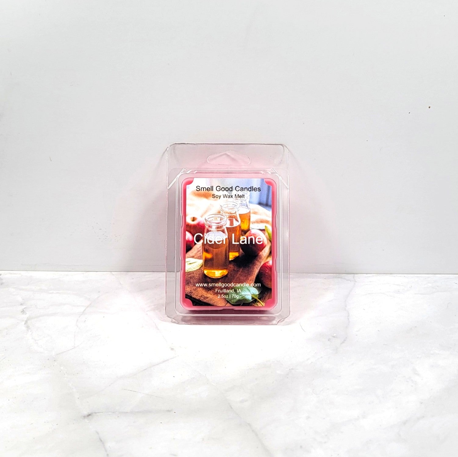 Scented wax melt packaging labeled 'Cider Lane' on a white background