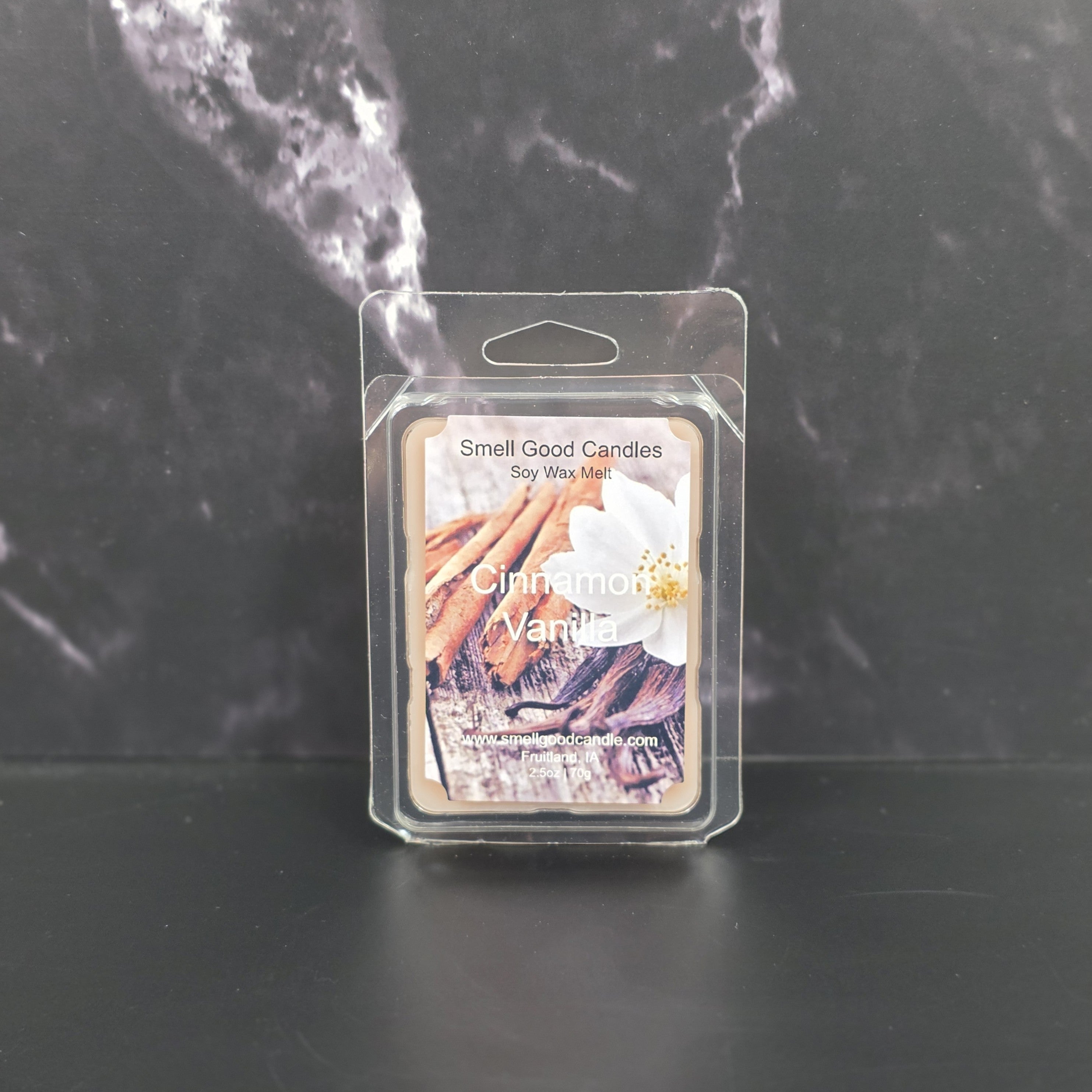 Cinnamon Vanilla wax melt packaging on a dark marble background