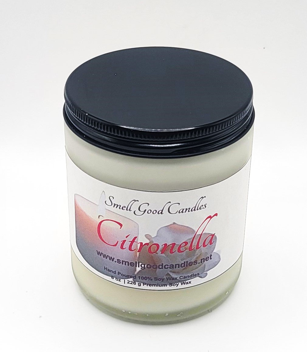 Natural bug-repellent candle with floral and citrus fragrance