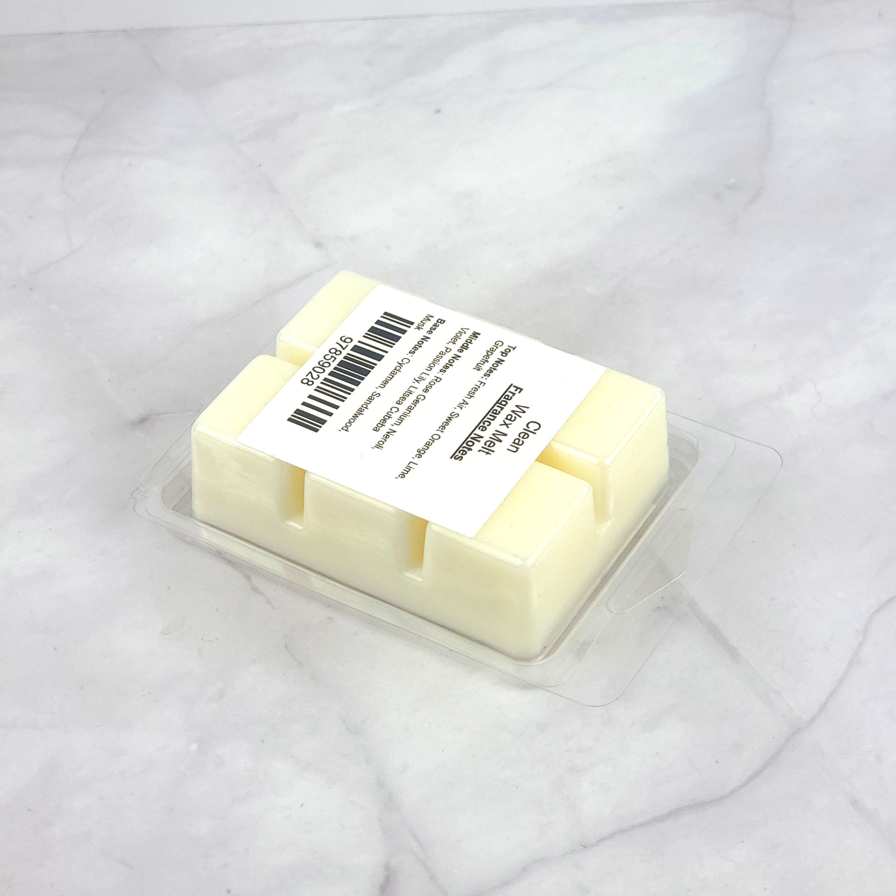 DLish-inspired Clean Wax Melt with fresh air, rose geranium, and sandalwood, providing a long-lasting, eco-friendly burn.