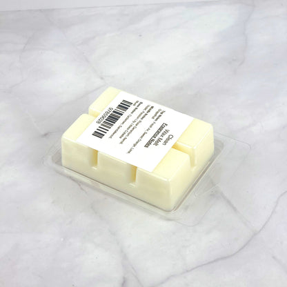 DLish-inspired Clean Wax Melt with fresh air, rose geranium, and sandalwood, providing a long-lasting, eco-friendly burn.