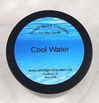Cool Water soy wax candle - Closed matte black tin with bright blue label, 8 oz