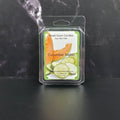 Cucumber Melon wax melt packaging on a dark marble surface