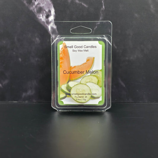 Cucumber Melon wax melt packaging on a dark marble surface