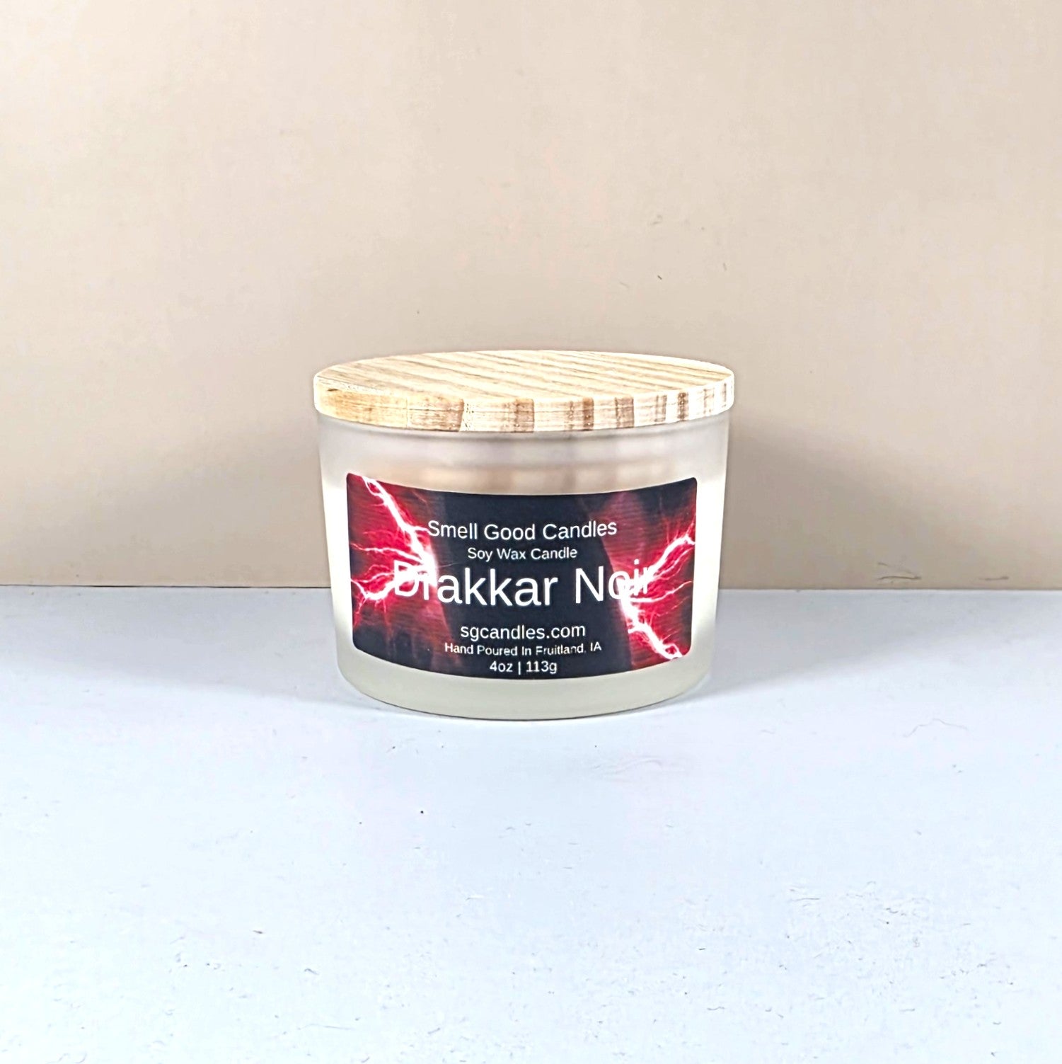 4oz Drakkar Noir soy candle in frosted glass jar for luxury home decor.