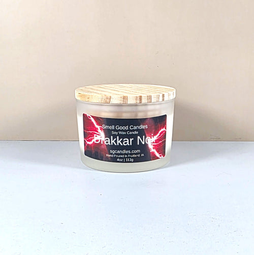 4oz Drakkar Noir soy candle in frosted glass jar for luxury home decor.