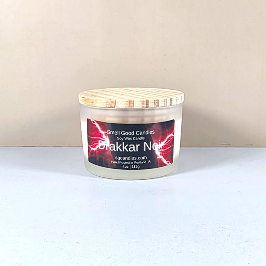 4oz Drakkar Noir soy candle in frosted glass jar for luxury home decor.