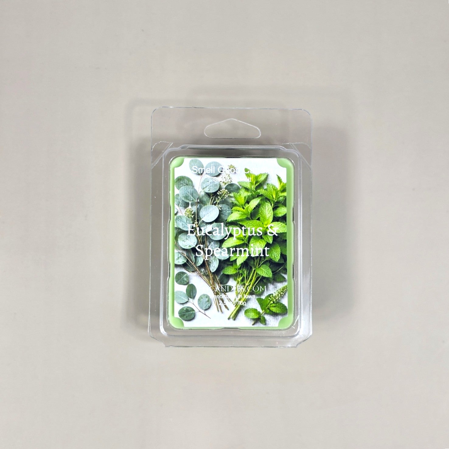 Clear 6-cavity clamshell packaging featuring light green soy wax melt cubes. The transparent container showcases the smooth, artisanal texture of the hand-poured wax.