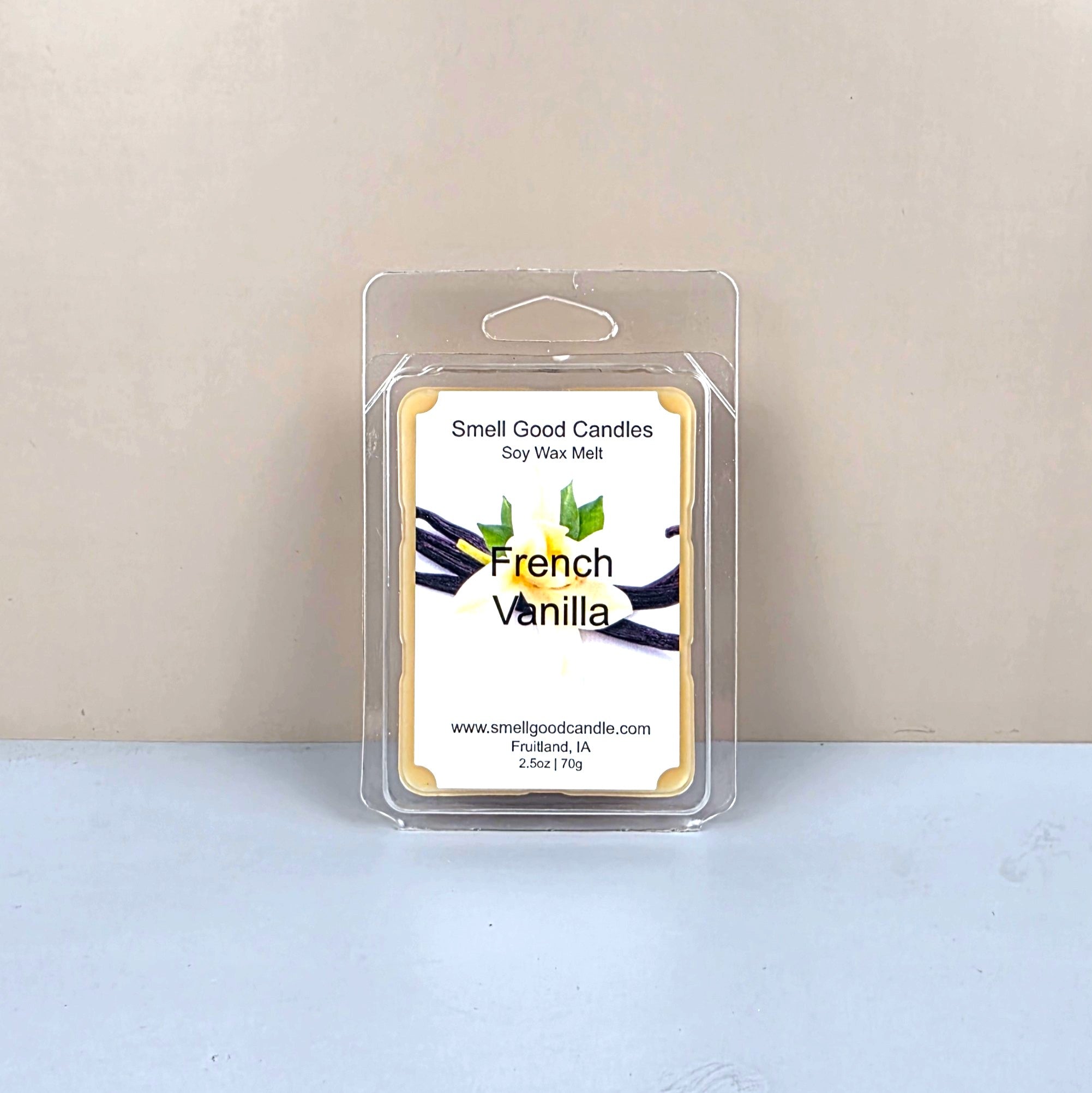 Packaged soy wax melt with 'French Vanilla' fragrance on a light background