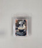 Packaged wax melt with 'Freshly Brewed Coffee' design on a gray background