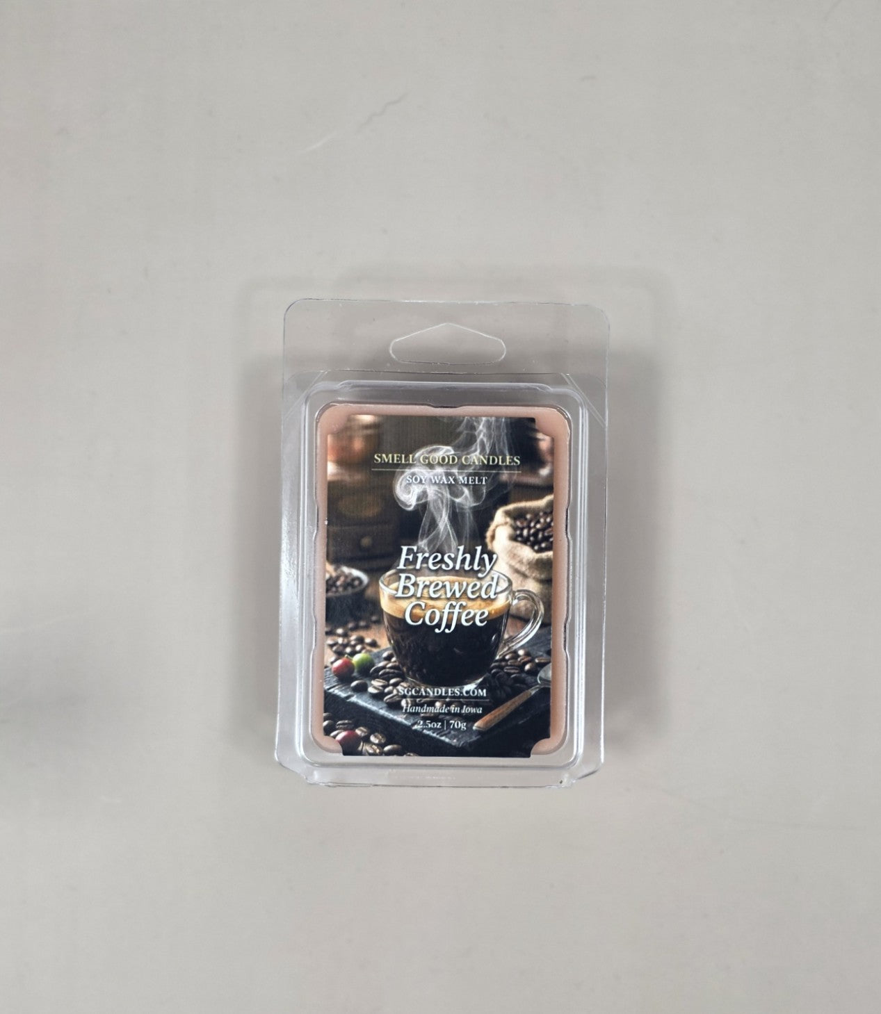 Packaged wax melt with 'Freshly Brewed Coffee' design on a gray background