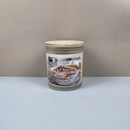 Candle jar labeled 'Fruity Pebbles' on a plain background