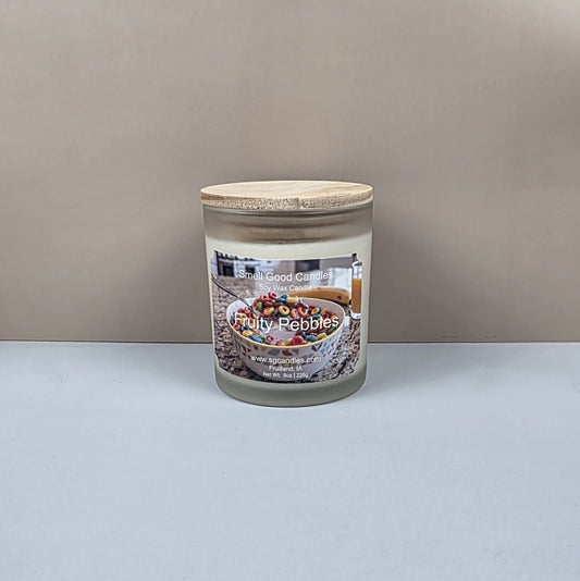 Candle jar labeled 'Fruity Pebbles' on a plain background