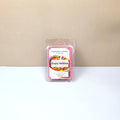 Hand-poured Fruity Pebbles soy wax melts in a clear clamshell package featuring a professional scent label.
