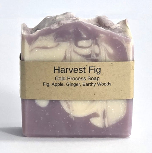 Harvest Fig cold process natural soap bar with brown paper label detailing scent notes of fig, apple, and ginger from Smell Good Candles in Fruitland, Iowa.