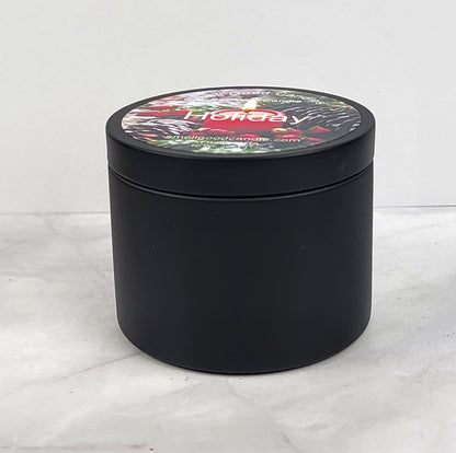 Christmas candle with fruit, fir, and pine notes