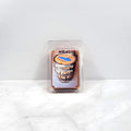 Hand-poured wax melt featuring cozy, bourbon-inspired decor