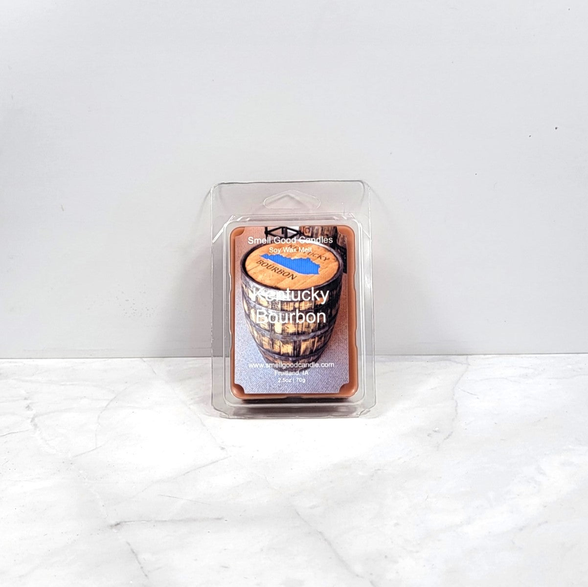 Hand-poured wax melt featuring cozy, bourbon-inspired decor
