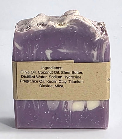 Ingredient list label on the back of a handmade Lavender Sky artisan soap bar featuring nourishing olive oil, shea butter, and coconut oil.