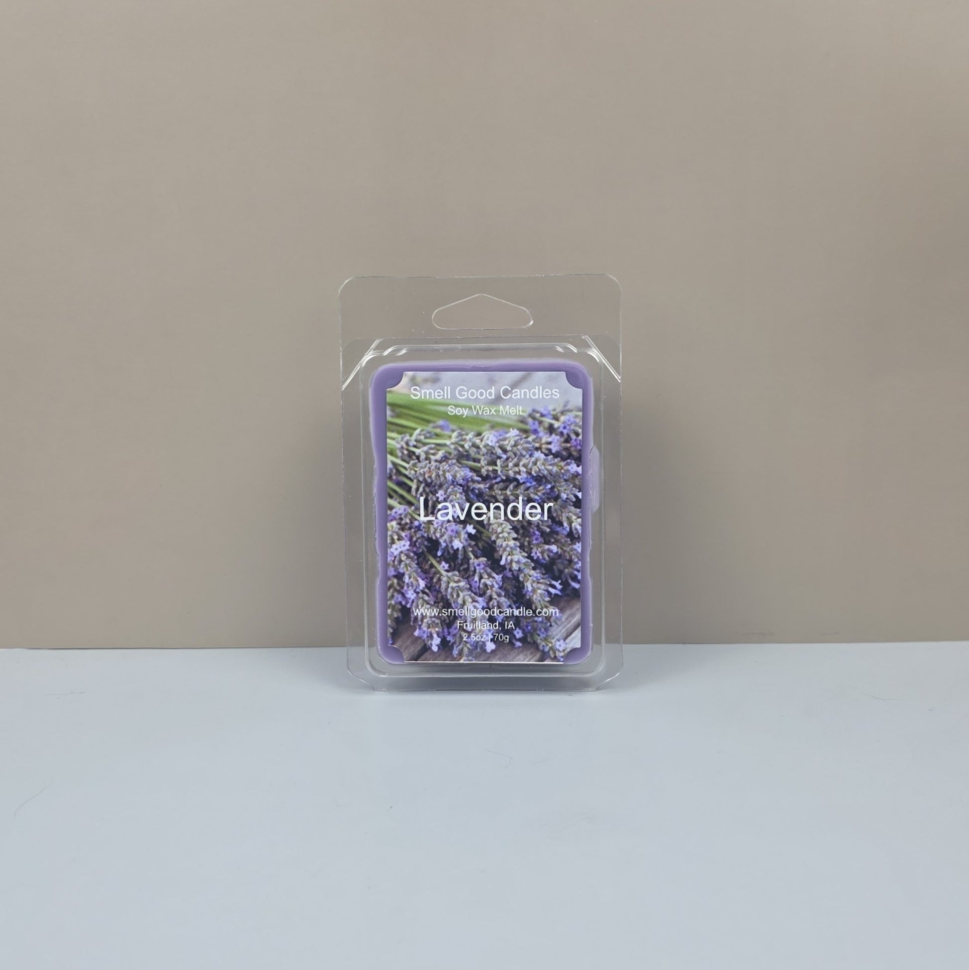 Packaged lavender candle melt on a neutral background