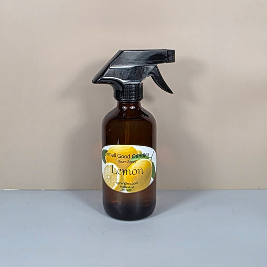 8oz clear room spray bottle with a minimalist Lemon fragrance label and fine mist sprayer.