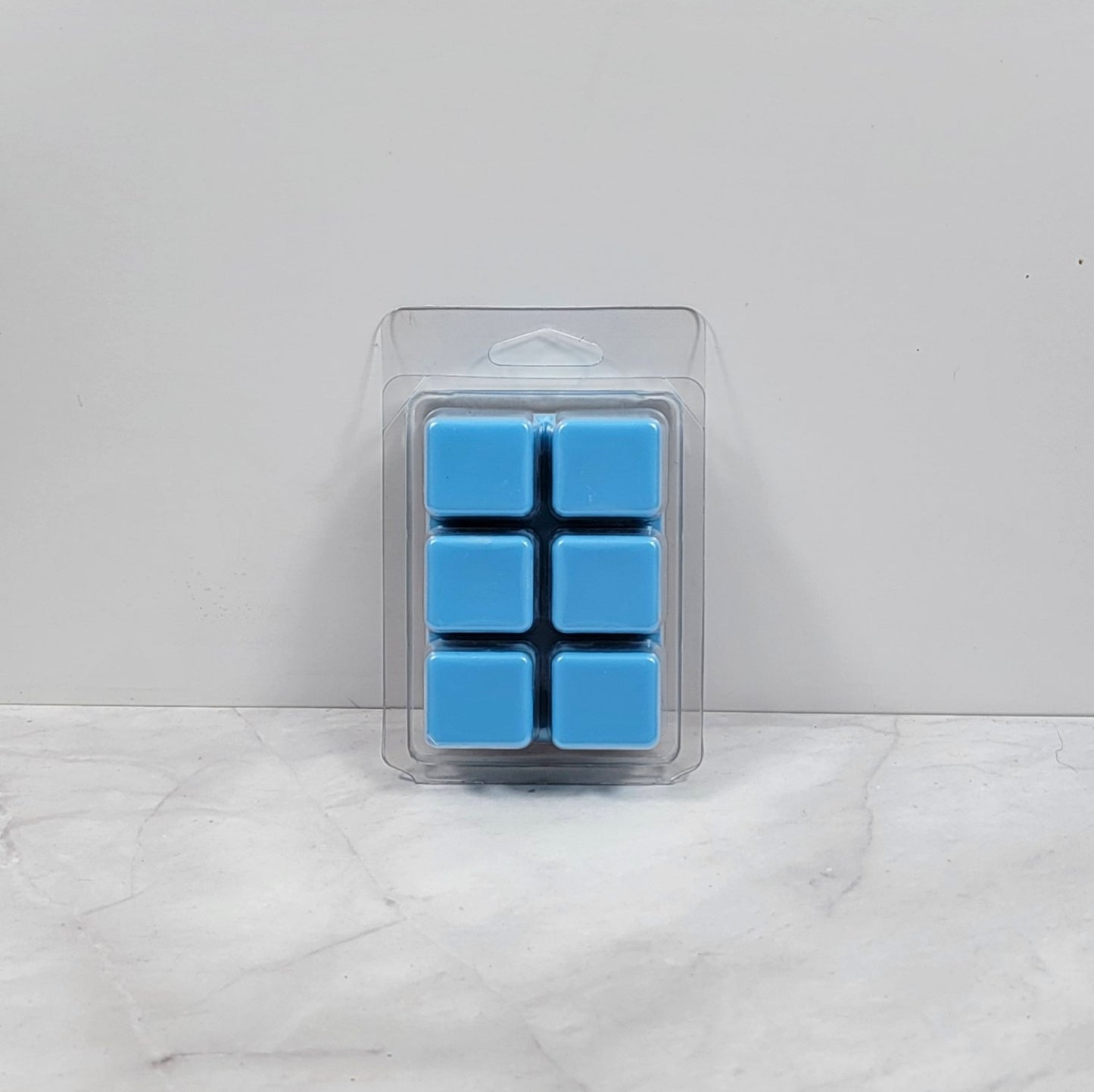 Soy wax melt on soft background with magic-inspired aesthetic