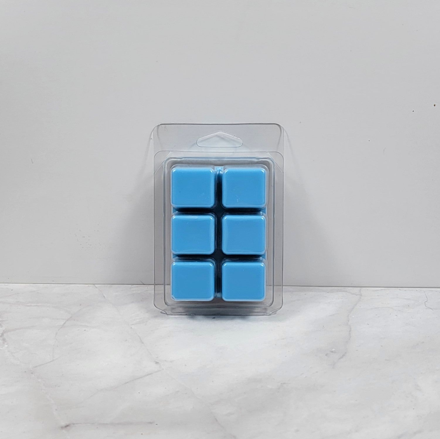 Soy wax melt on soft background with magic-inspired aesthetic