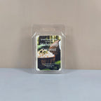Mahogany Coconut soy wax melt with luxury label featuring tropical coconut and rich wood imagery.