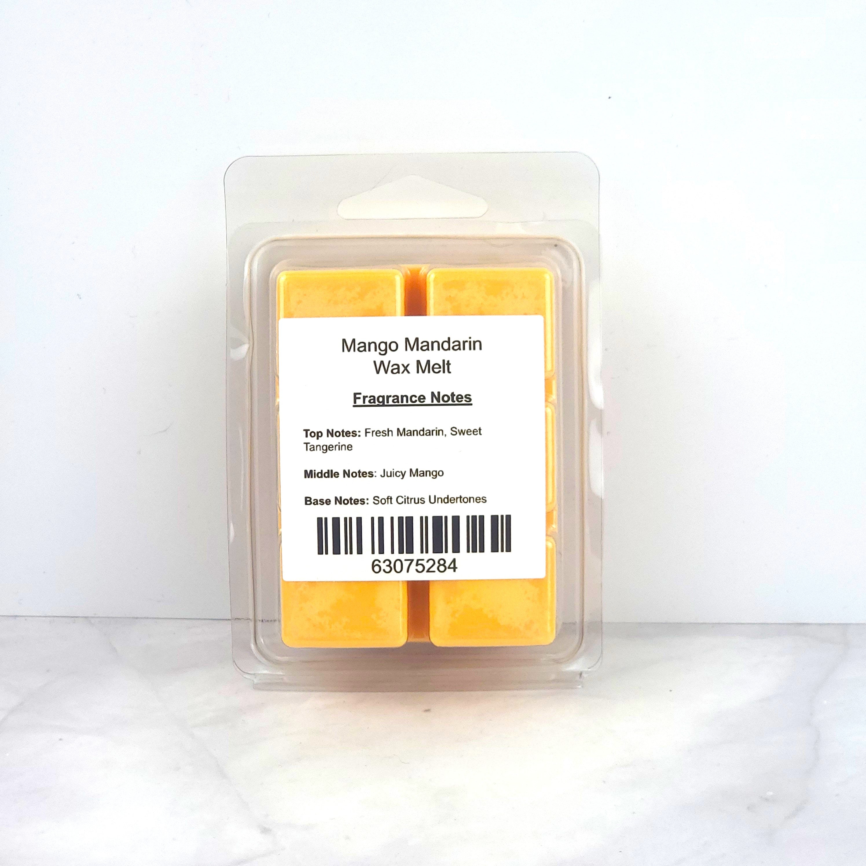 Hand-poured 100% soy wax melt with bright citrus and tropical mango fragrance, creating an uplifting and refreshing home scent.