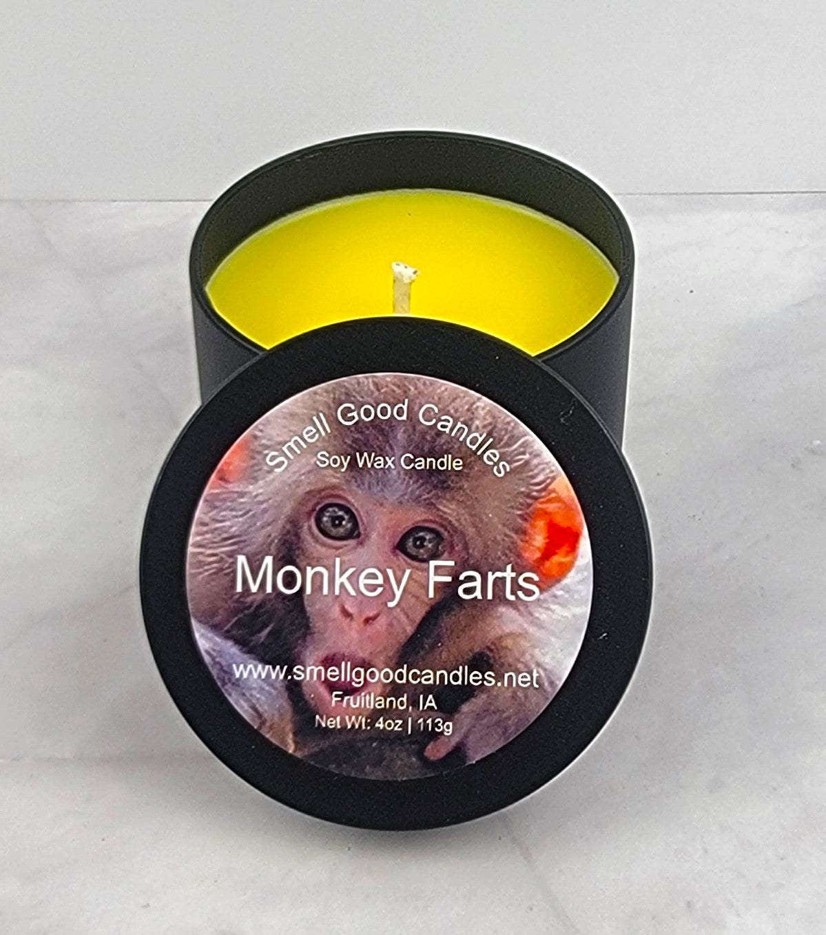 Monkey Farts Premium Scented Candle – Fresh banana, kiwi, and vanilla fragrance.