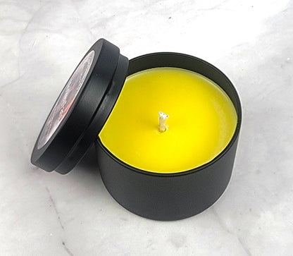 Monkey Farts 4oz Soy Candle showing hand-poured soy wax inside black candle tin