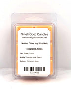 Soy wax melt beside spiced apple cider drink