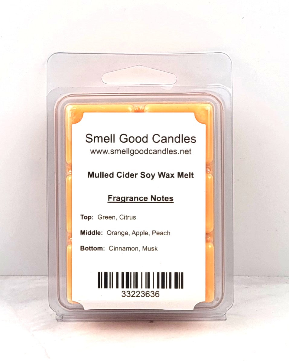 Soy wax melt beside spiced apple cider drink