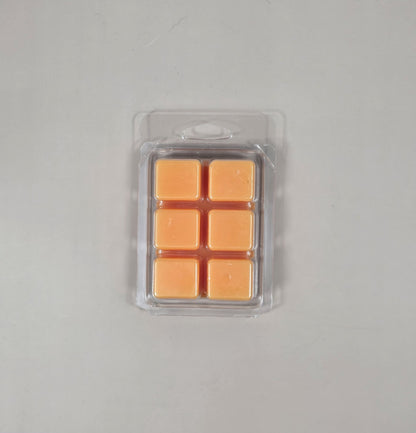 Orange Sherbet Soy Wax Melt cubes in hand-poured soy wax clamshell packaging