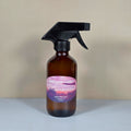 8oz Pink Lavender Clouds room spray bottle with a minimalist label on a clean, modern shelf.