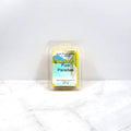 Wax melt container labeled 'Pure Paradise' on a white background